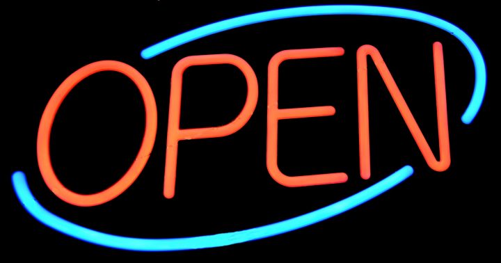 picture of a neon sign that says open